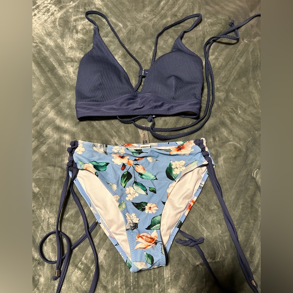 Cup shaped two-piece bathing suit.